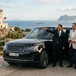 Two_leaders_near_SUV